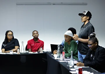 CYAC speaking in meeting